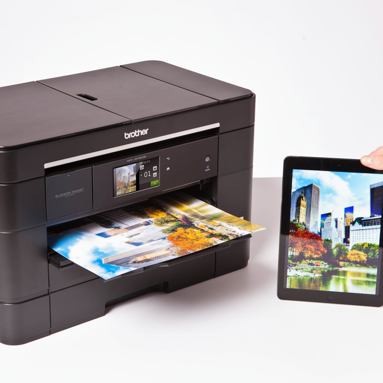 Brother MFC-J5720DW printer printing a colour page