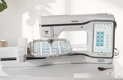 Image of the Brother Stellaire2 Innov-is XE2 Embroidery Machine displaying the Matrix Copy feature on screen and stitched out 