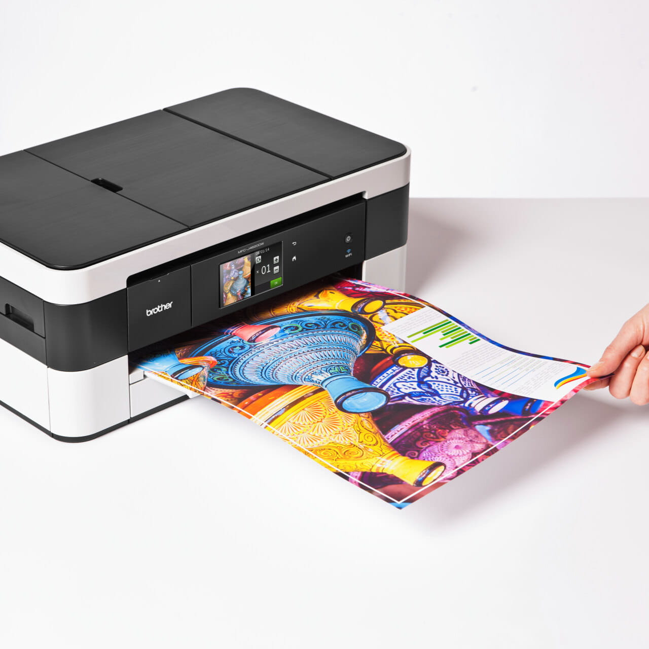 Brother MFC-J4620DW printer printing a colour page