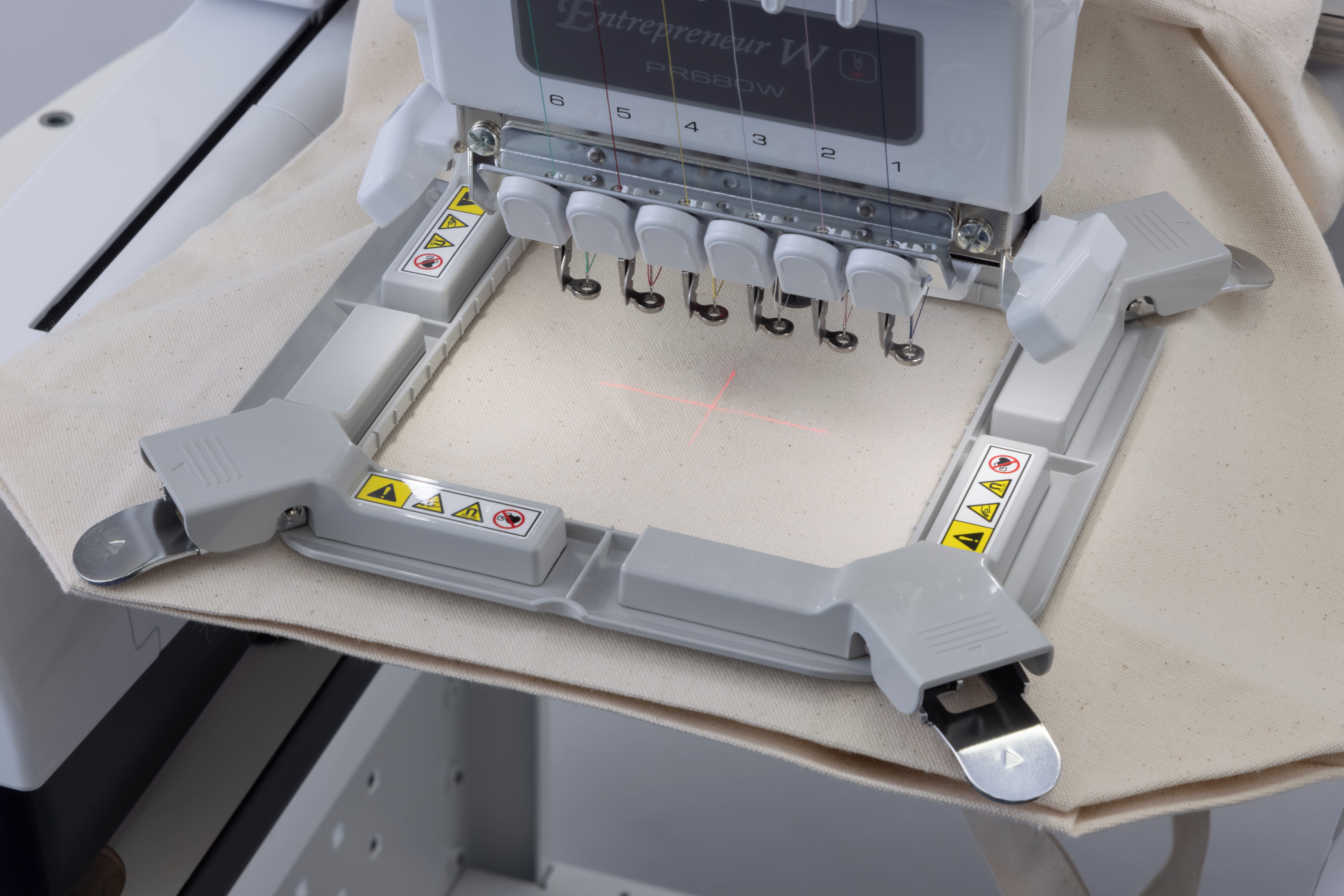 Image of the PRVMFLAP attached to a Brother Multineedle machine