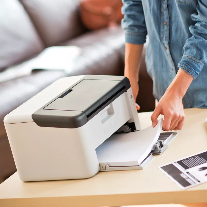 mono laser printer hl-1210w open paper tray on desk