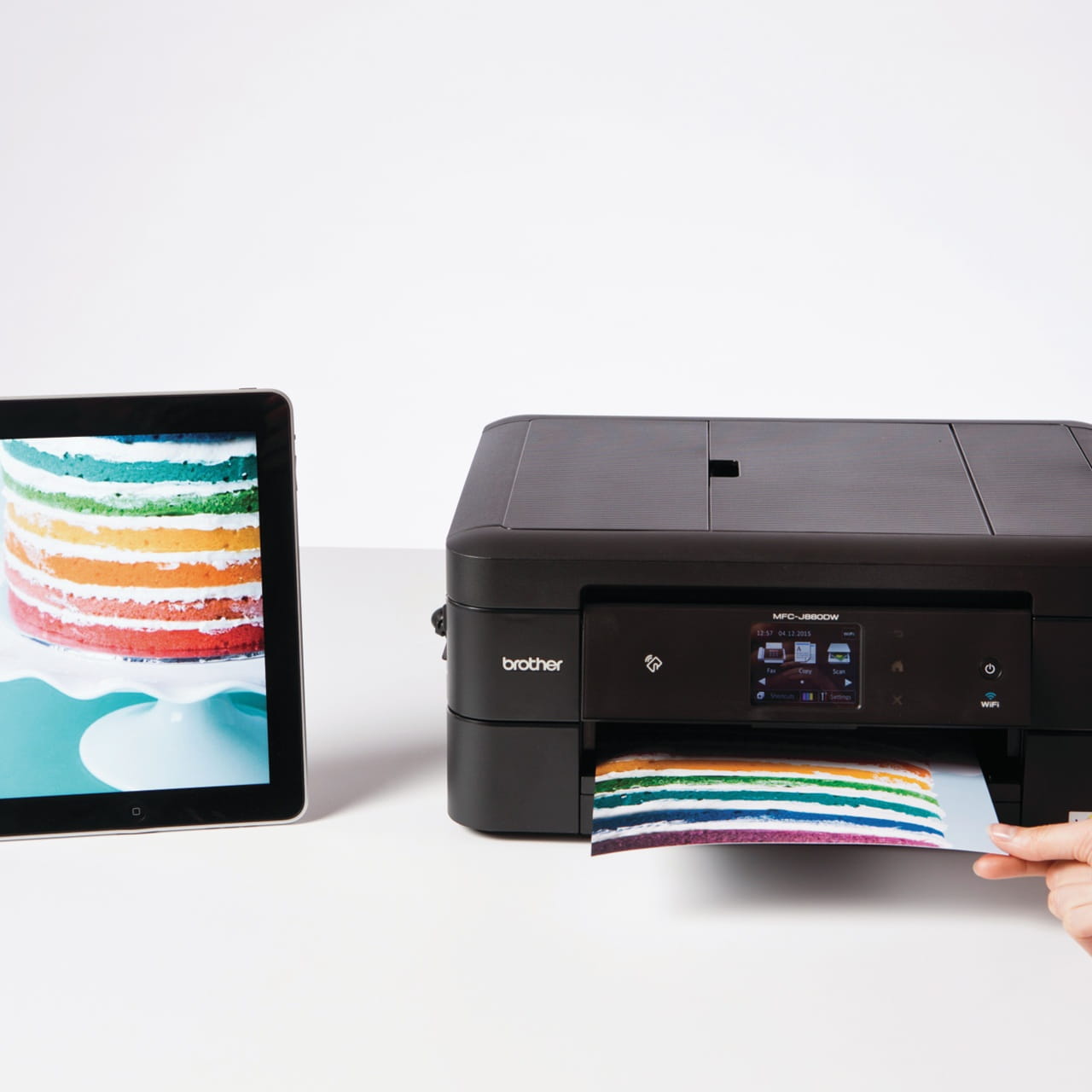 Brother MFC-J880DW printer printing a colour page