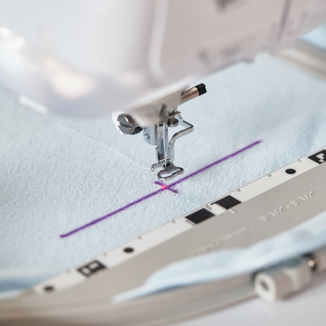 Image of Brother Innov-is Stellaire displaying zoomed in 2 point positioning function in the  in hoop