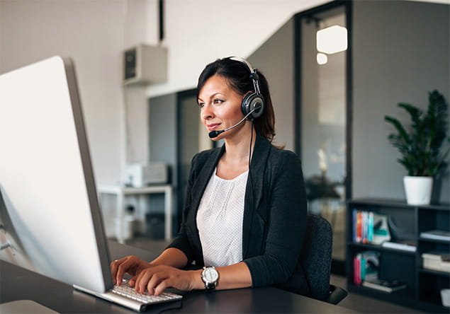 Female employee working on a computer