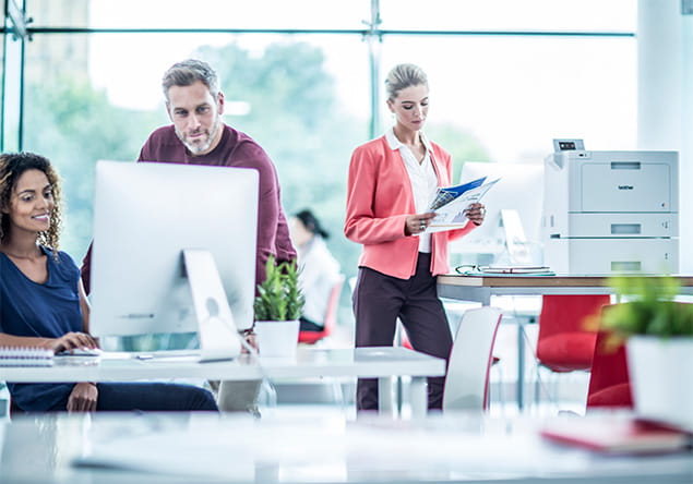 Employees in a brightly lit office