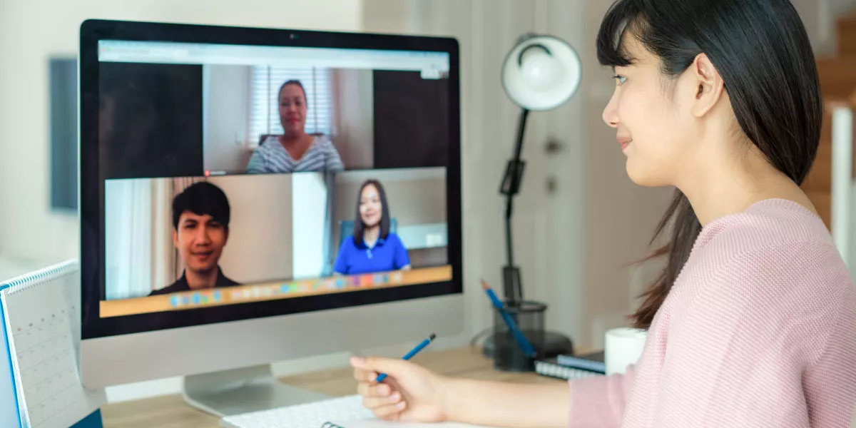 Lady on computer during a virtual job interview