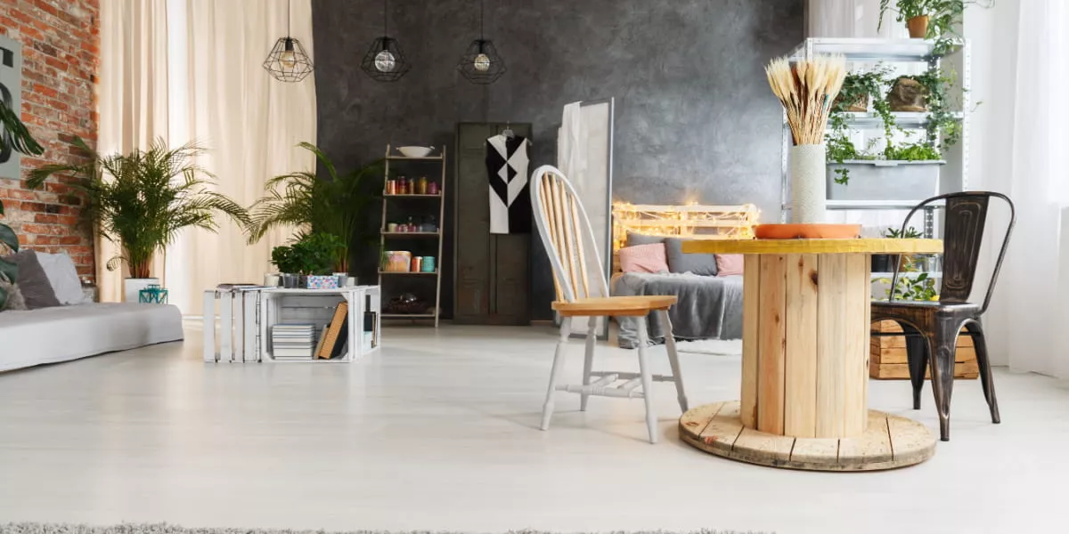 An upcycled piece of wood that's now a table in a home office setting