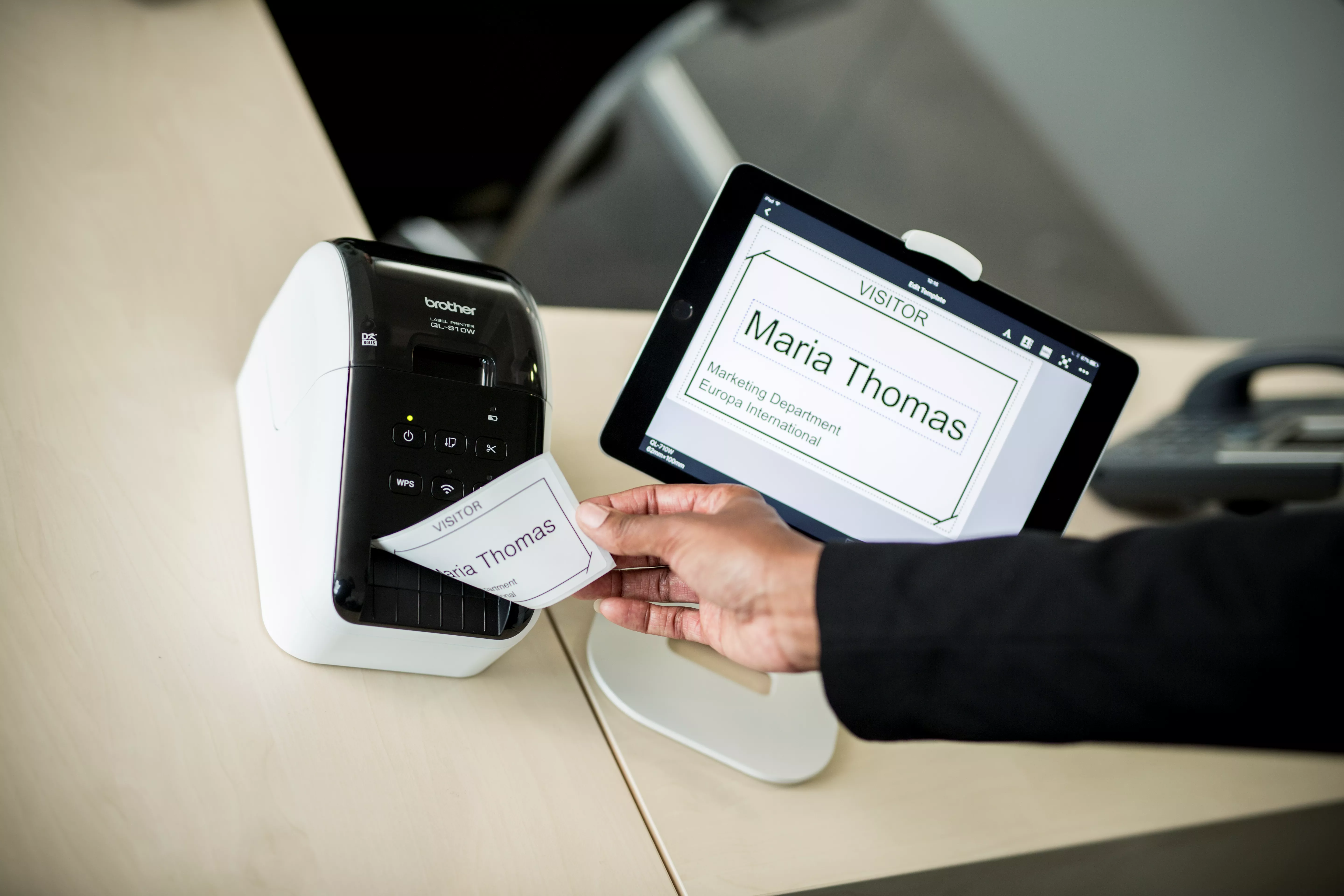 QL label printer printing a badge