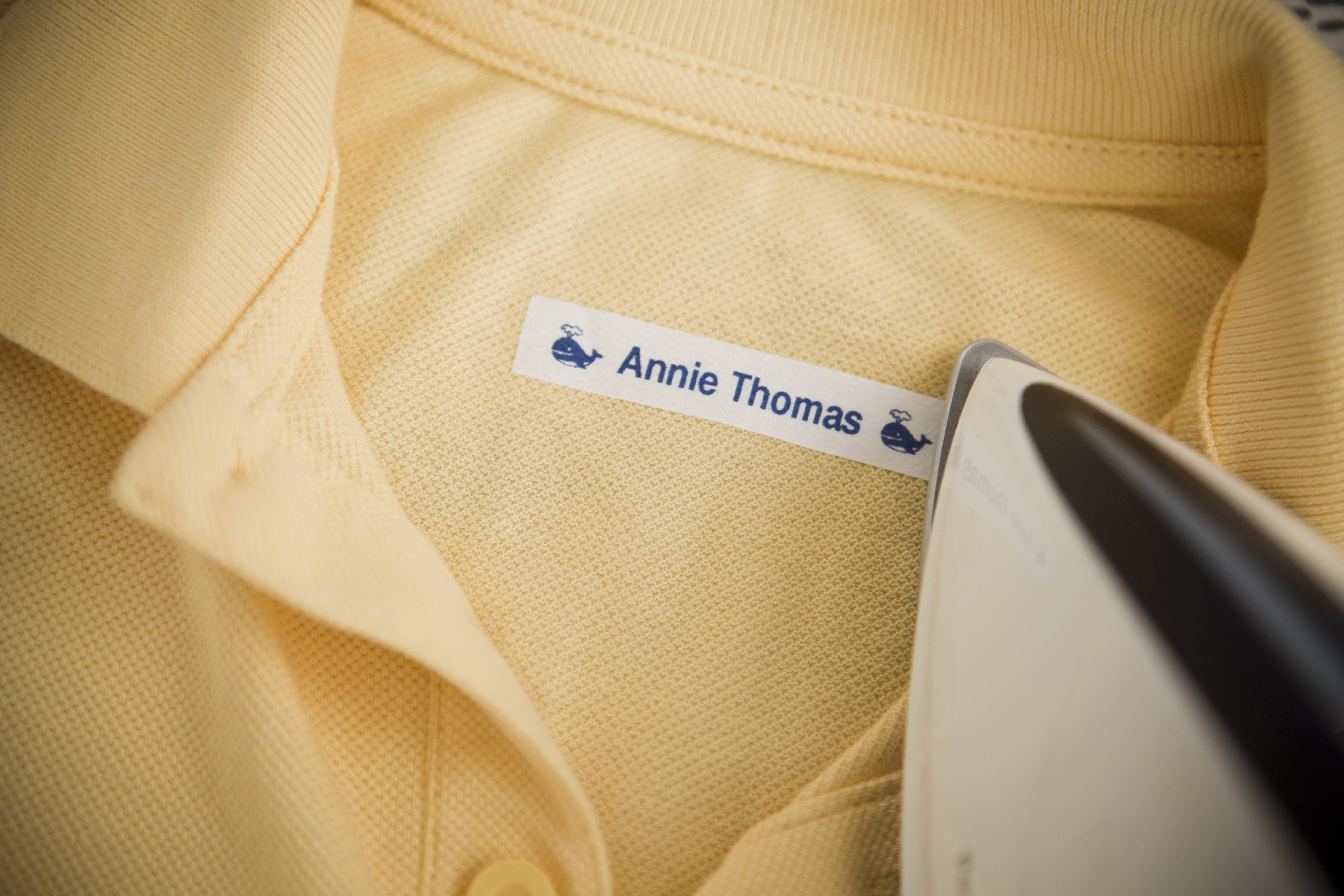 iron on label tape on yellow shirt
