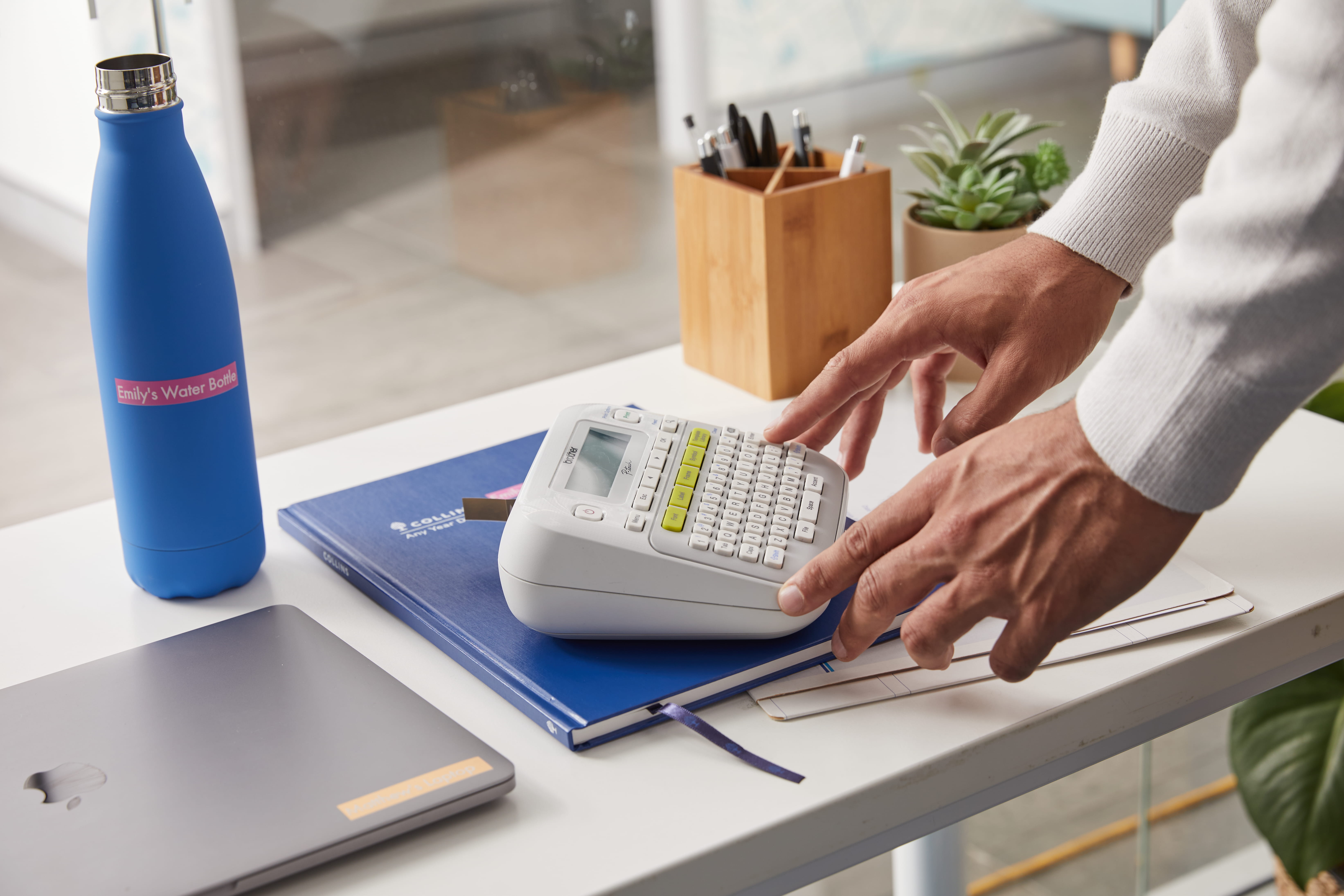 person using PT-D210