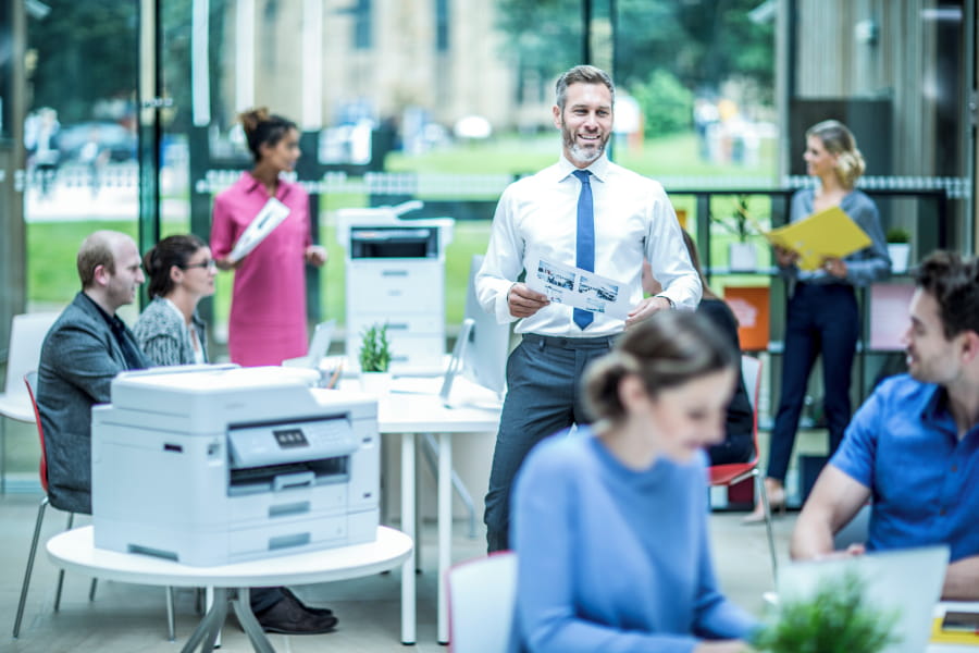 Employees in a brightly lit office