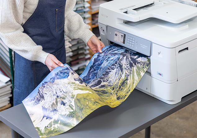 roll printer printing out panoramic photo