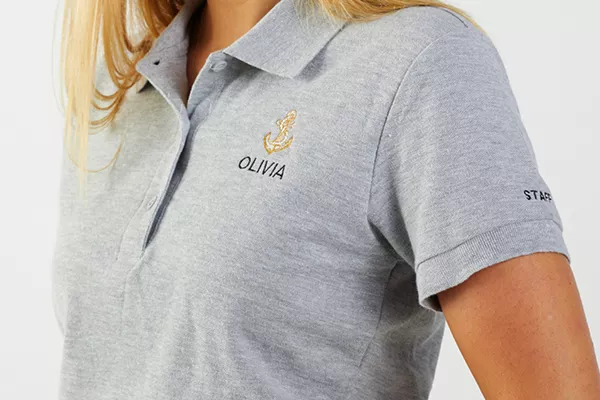 Image of an embroidered logo on a polo shirt