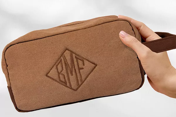 image of quick and easy initials embroidered on a toiletries case