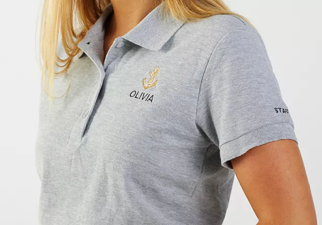 Image of an embroidered logo on a polo shirt