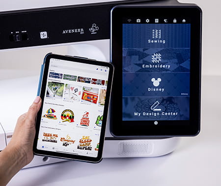 Image of a smart device showing te Artspira App being held next to the screen of the Aveneer EV1 machine