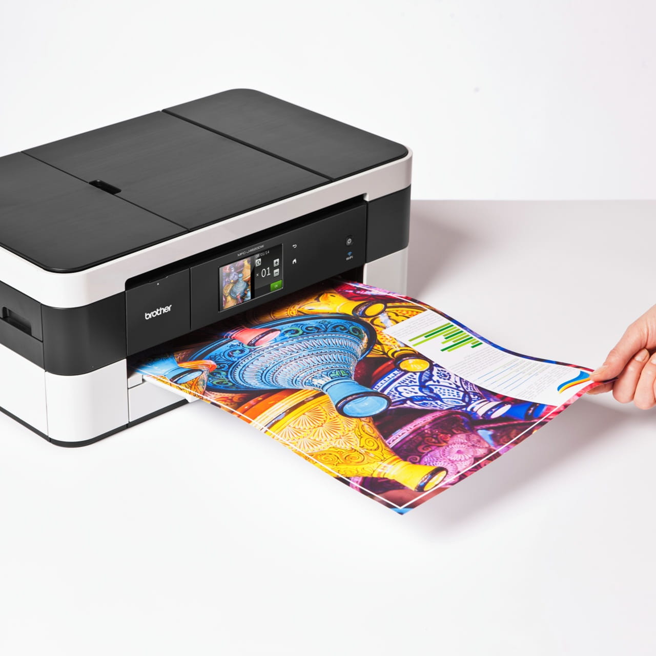 Brother MFC-J4620DW printer printing a colour page