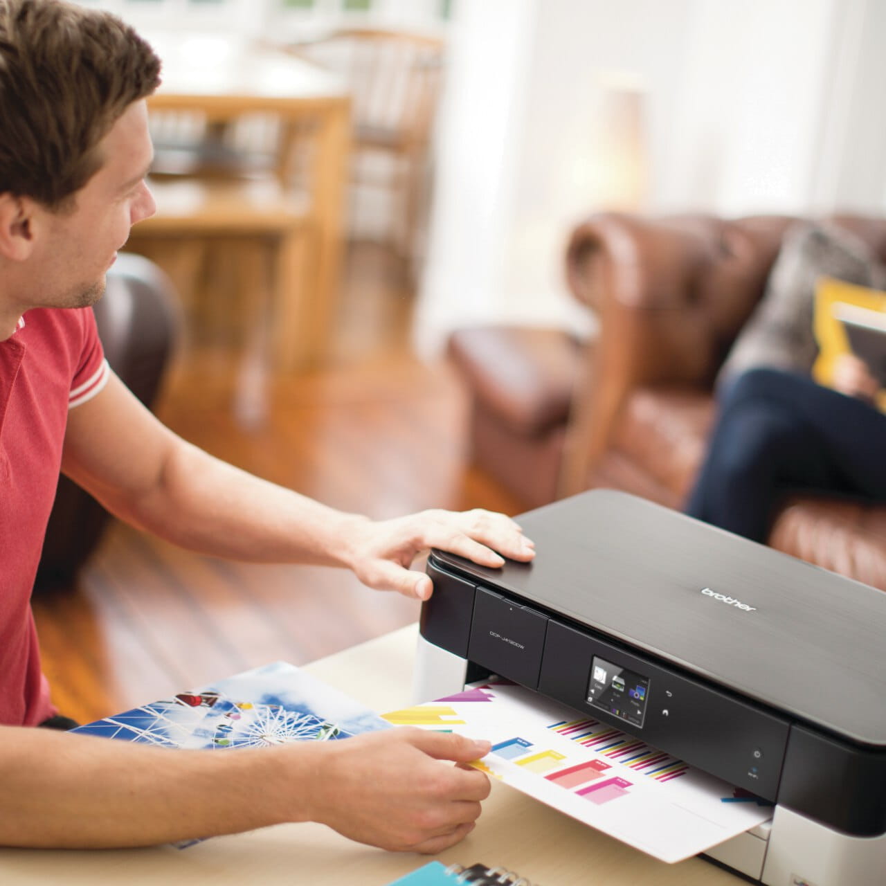 Brother DCP-J4120DW printer printing a colour page