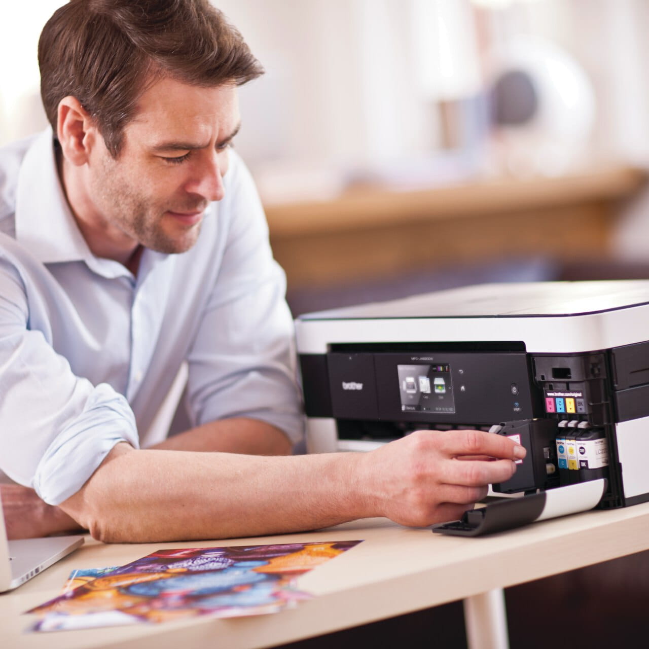 Brother MFC-J4620DW printer printing a colour page