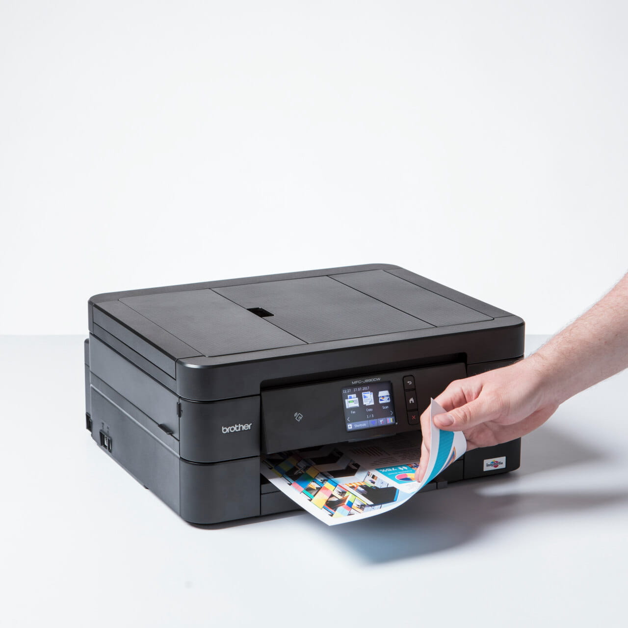 Brother MFC-J890DW printer printing a colour page