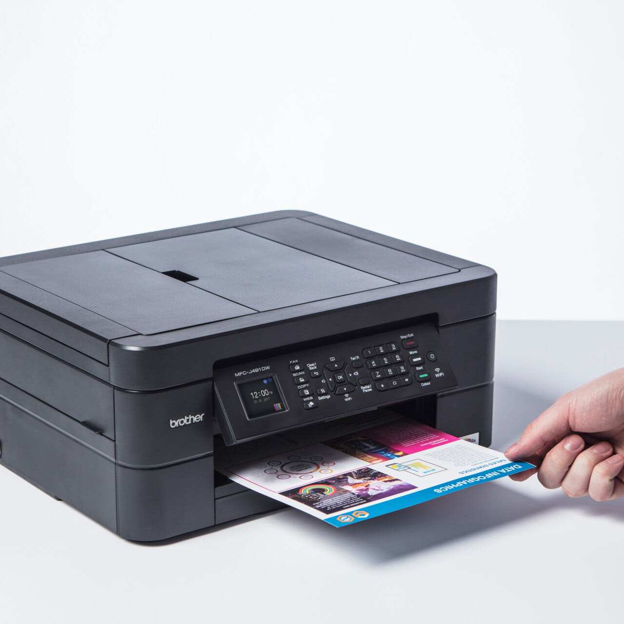 Brother MFC-J491DW printer printing a colour page
