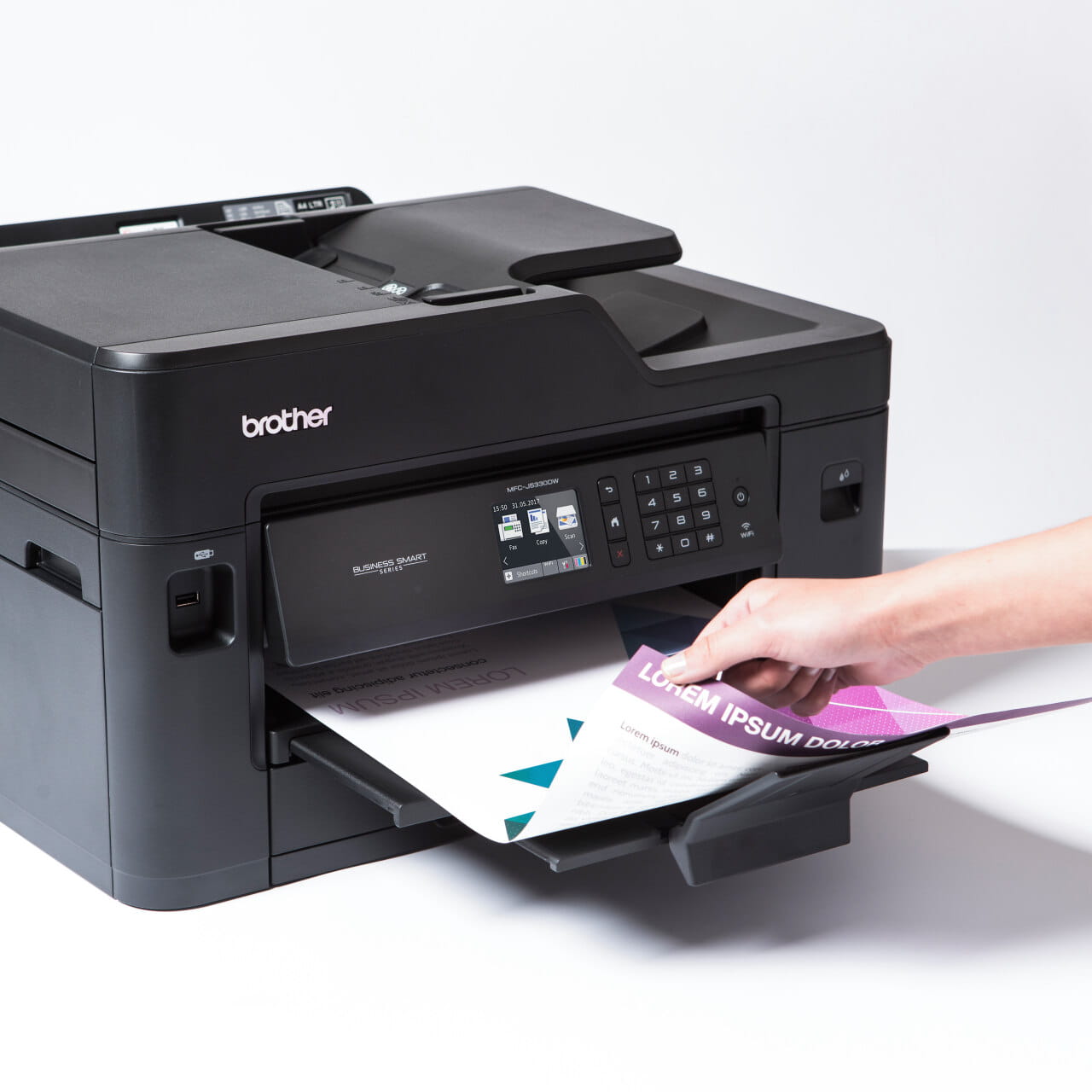 Brother MFC-5330DW printer printing a colour page
