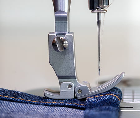Image of the flexible presser foot on the Brother PQ1600s high speed straight stitch sewing machine