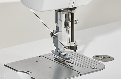 Image of the Brother PQ1600S high speed straight stitch sewing machine needle threader