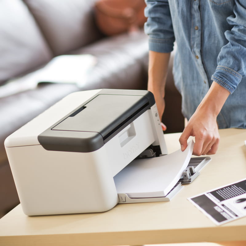 mono laser printer hl-1210w open paper tray on desk