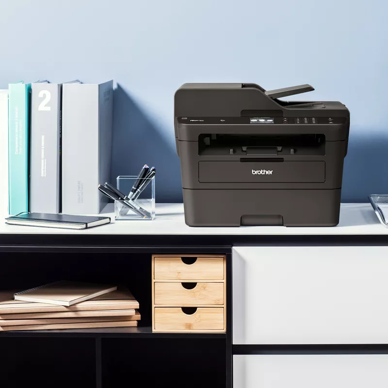 mono laser printer mfc-l2750dw on desk