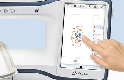 Image of the Brother Celeste CX1e Embroidery machine with a lady interacting with the large 10.1" interactive screen