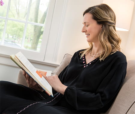 Image of a lady reading