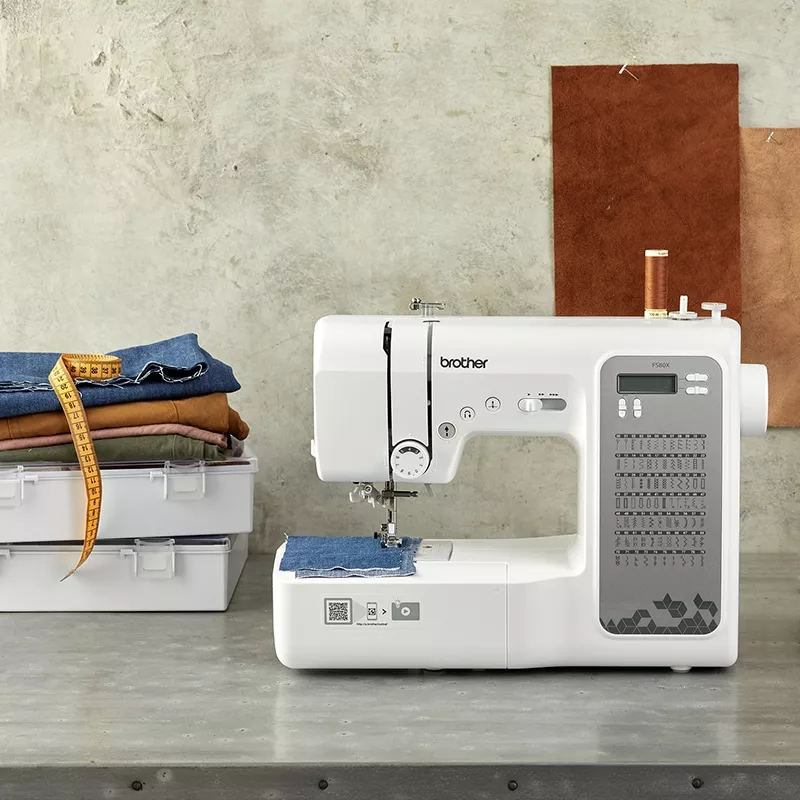 extra tough sewing machine fs80x on a table