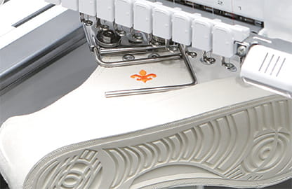 Image of the shoe frame attachment on the Brother PR1060W Embroidery machine.