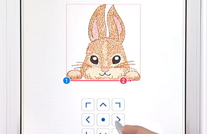 Image of a built-in design on the Brother Stellaire2 Innov-is XE2 Embroidery machine depicting a rabbit pocket topper utilising the 2-point positioning feature 