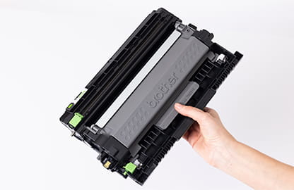 hand holding up a mono toner