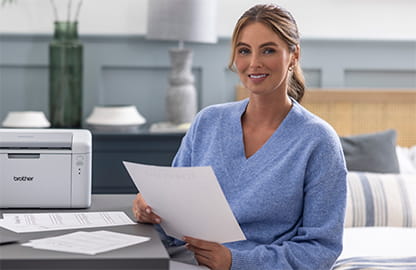 woman holding a piece of paper