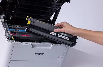 hand loading colour toner into printer