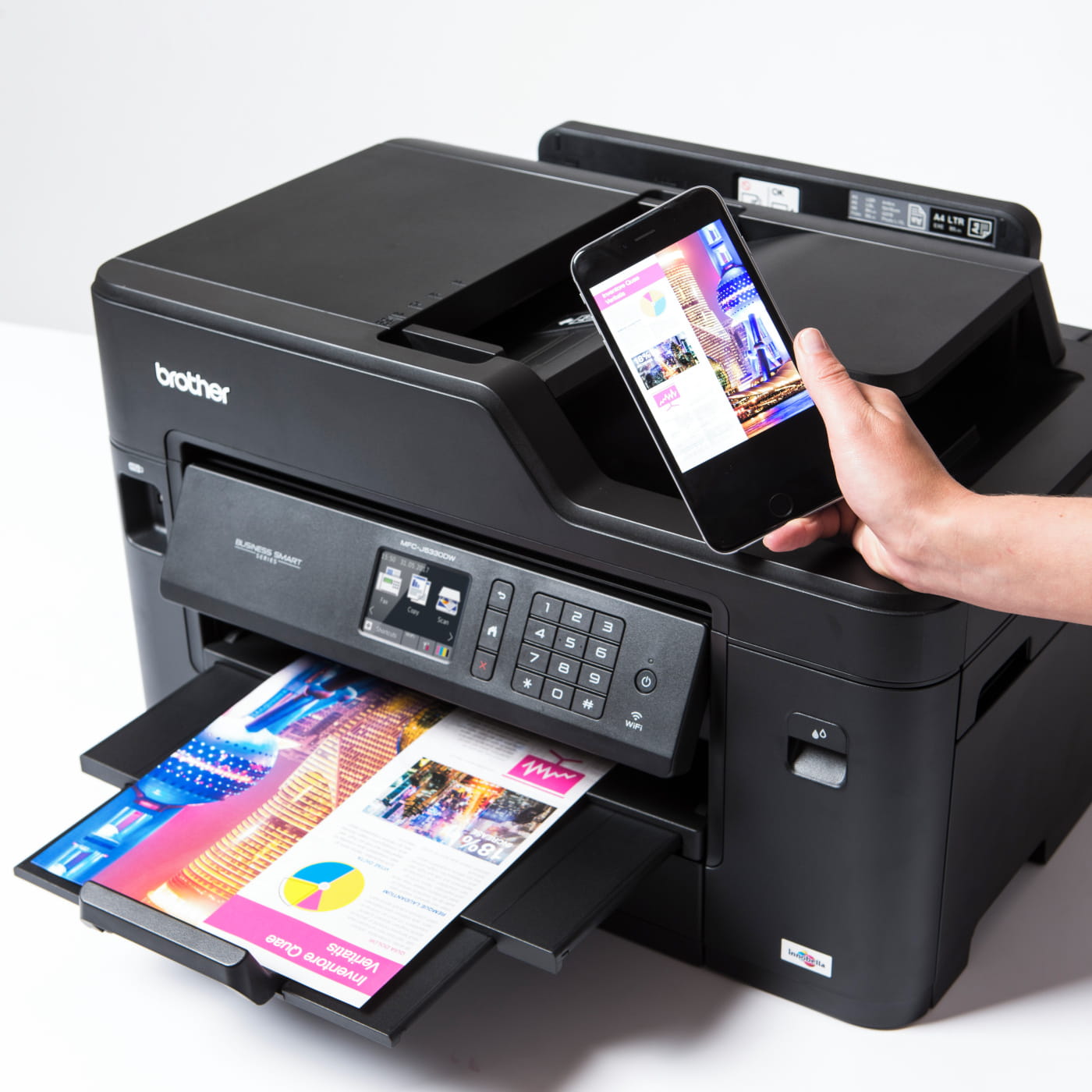 Brother MFC-5330DW printer printing a colour page