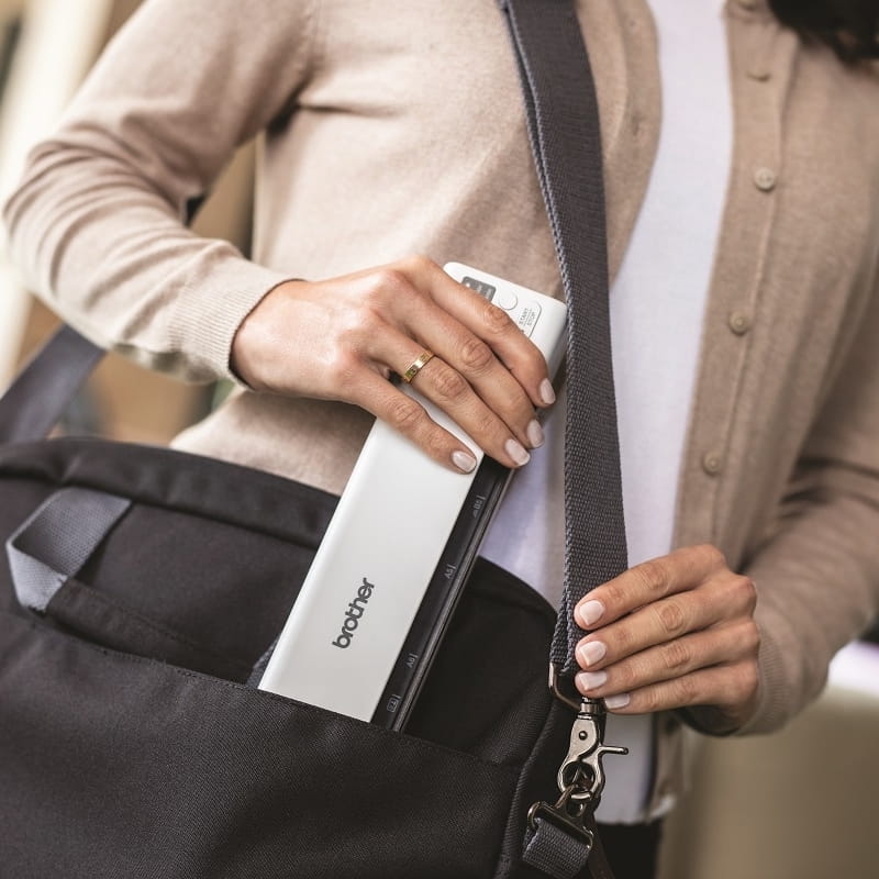 portable scanner brother ds-940dw in a laptop bag