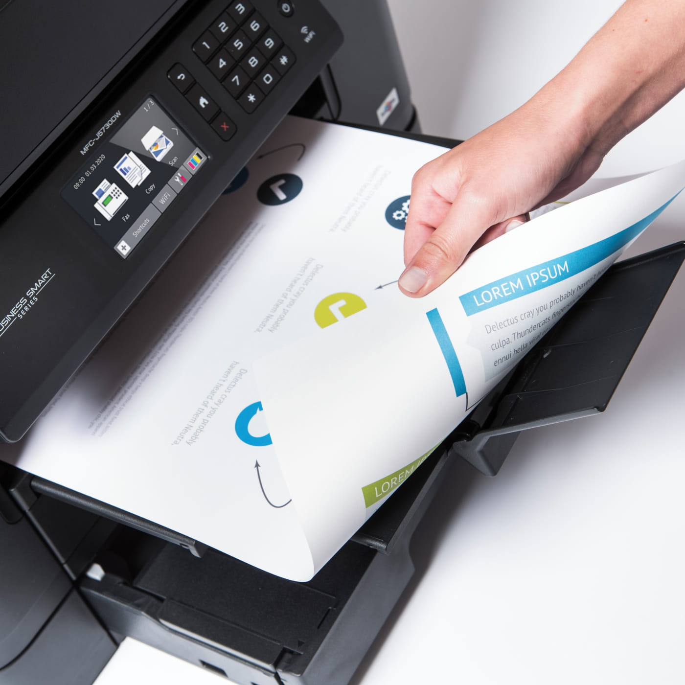 Brother MFC-J5730DW printer printing a colour page