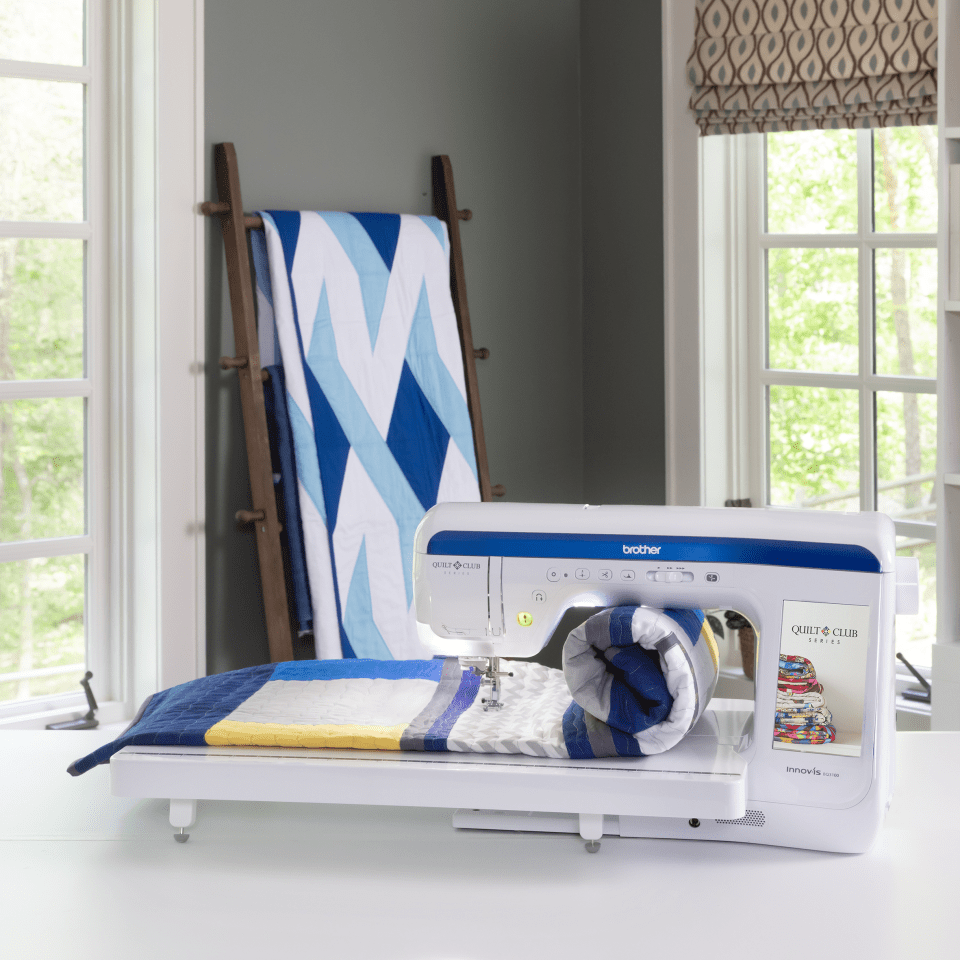 Brother BQ3100 handling a large quilt through its spacious needle-to-arm workspace