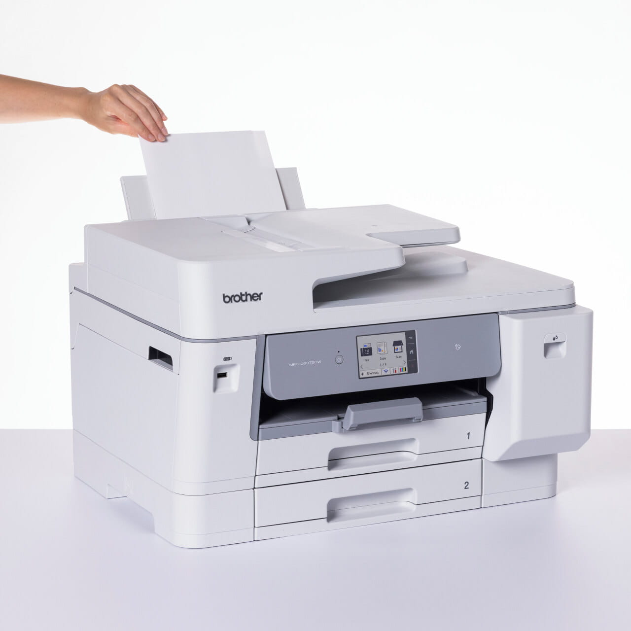 Brother MFC-J6975DW Inkjet Printer putting paper in the manual feed tray